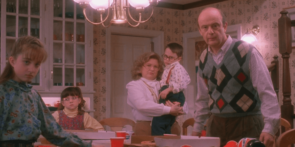 Kevin's family glares at him after the pizza incident.