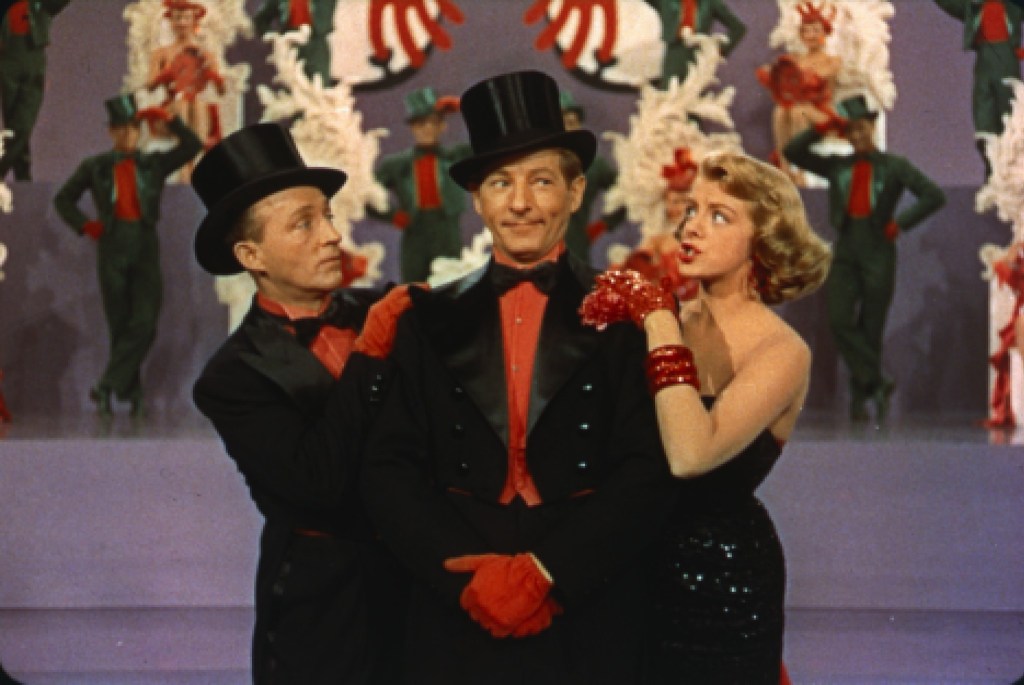 Bing Crosby, Danny Kaye, and Rosemary Clooney pose for the Minstrel Show number in White Christmas.